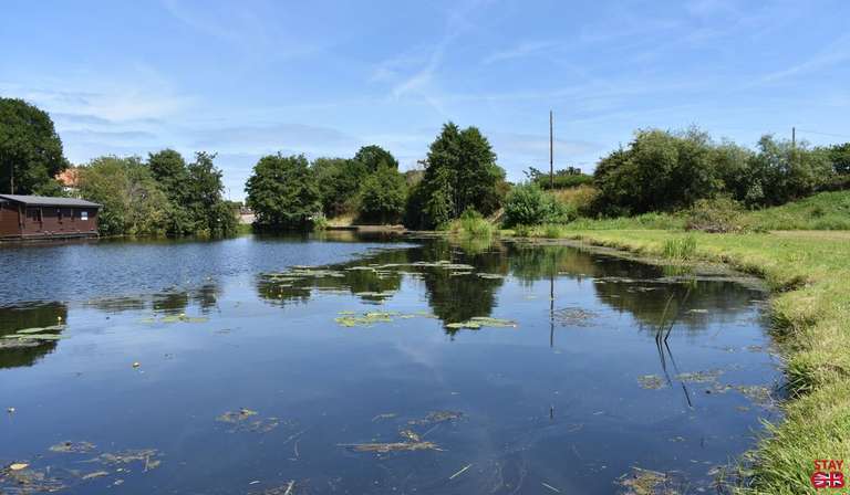 Wide expanse of river adjacent to Wayford Bridge